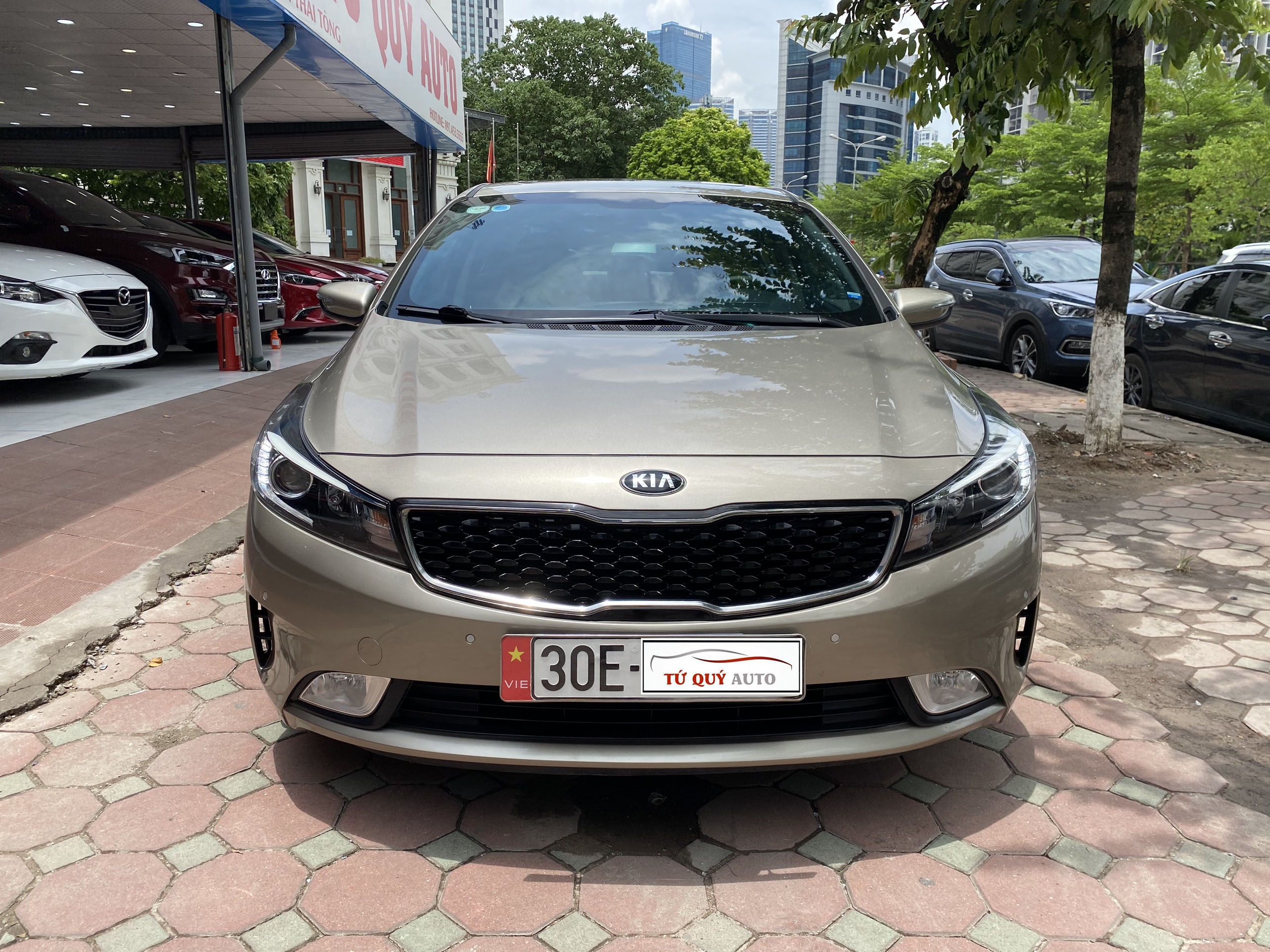 Xe Kia Cerato 1.6AT 2016 - Vàng Cát