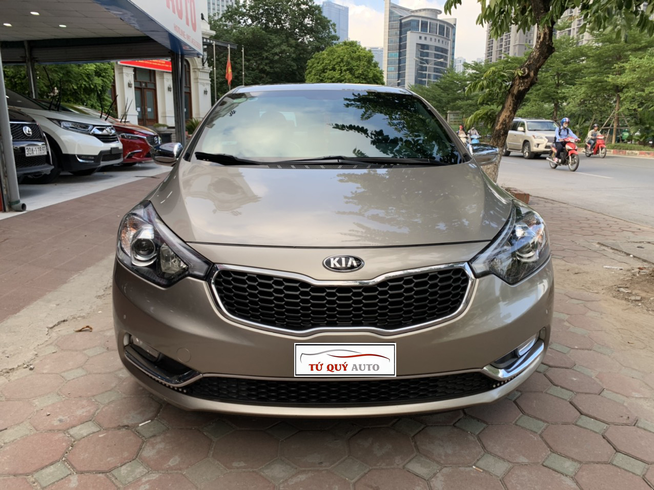 Xe Kia K3 1.6AT 2013 - Vàng Cát