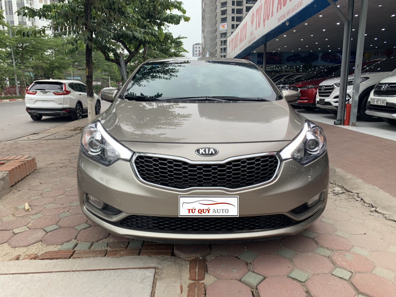 Xe Kia K3 1.6AT 2014 - Vàng Cát