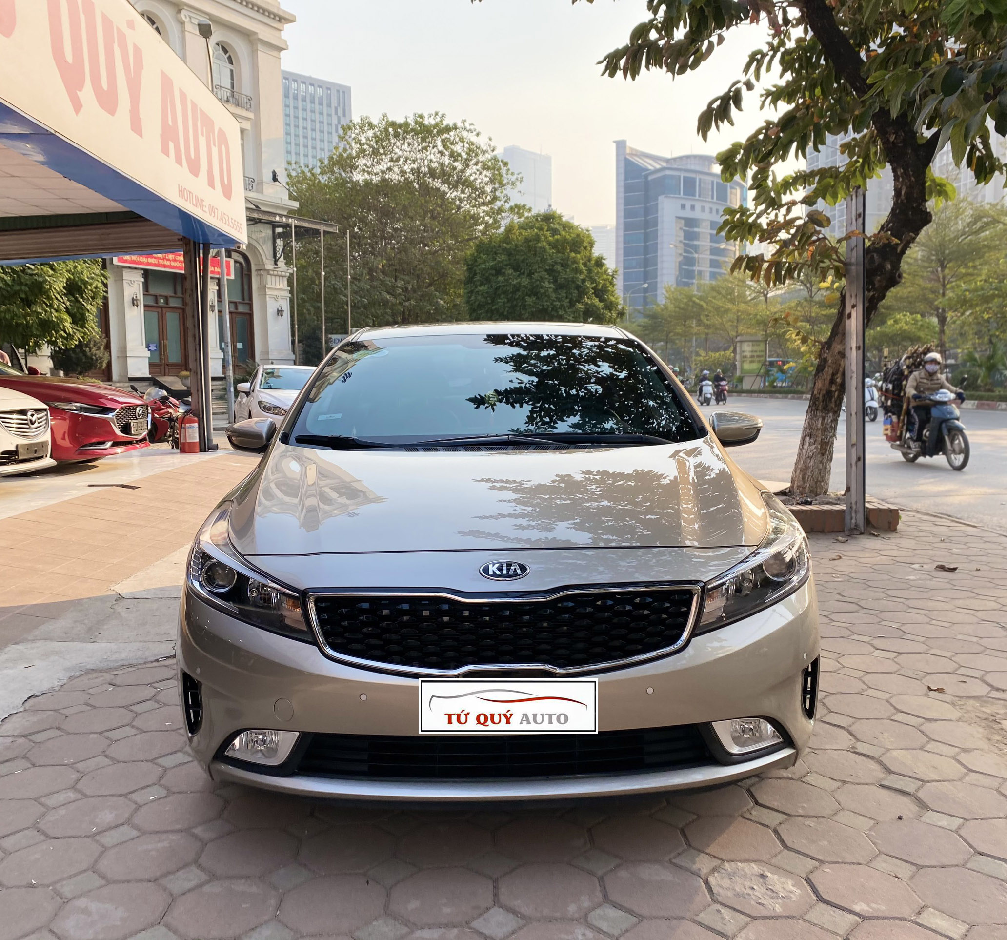 Xe Kia Cerato 1.6AT 2017 - Vàng Cát