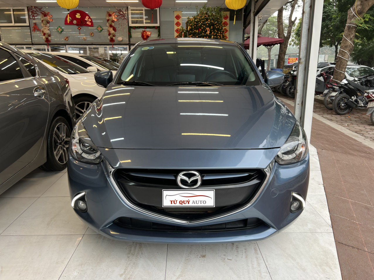 Xe Mazda 2 Hatchback 1.5AT 2016 - Xanh